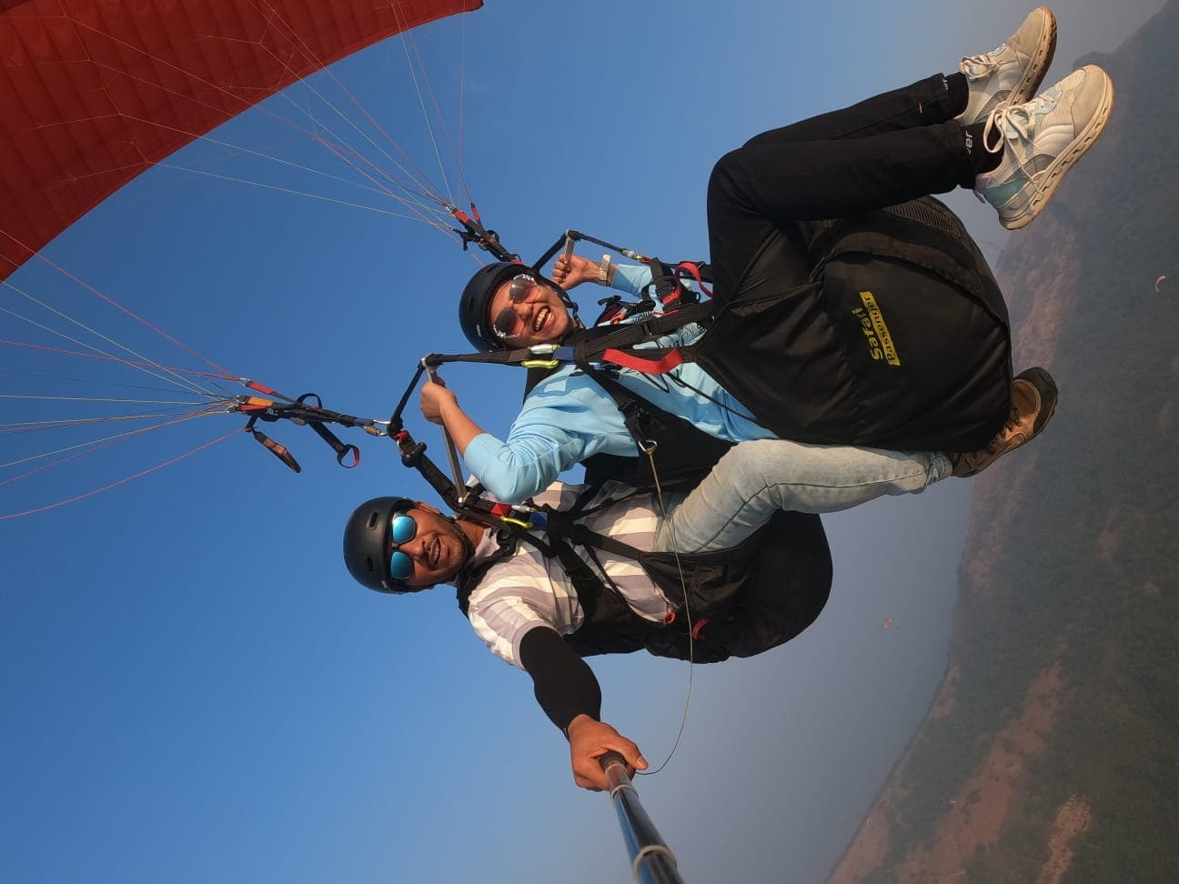 Wide aerial panorama of Kamshet landscape during tandem flight