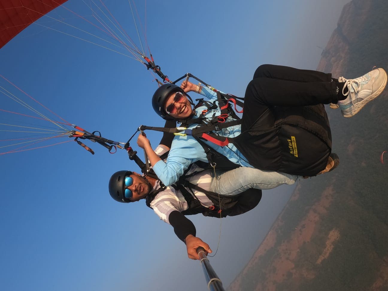 Smooth landing approach of tandem paraglider at Kamshet landing zone