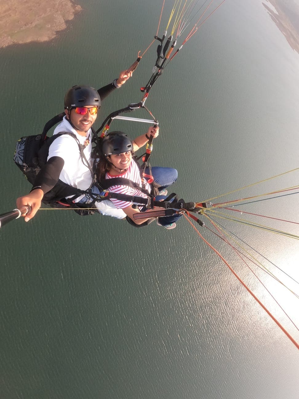 Sunrise Paragliding pilot and passenger landing at Kamshet