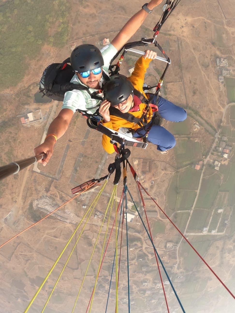 Paraglider catching thermals above Kamshet ridgeline